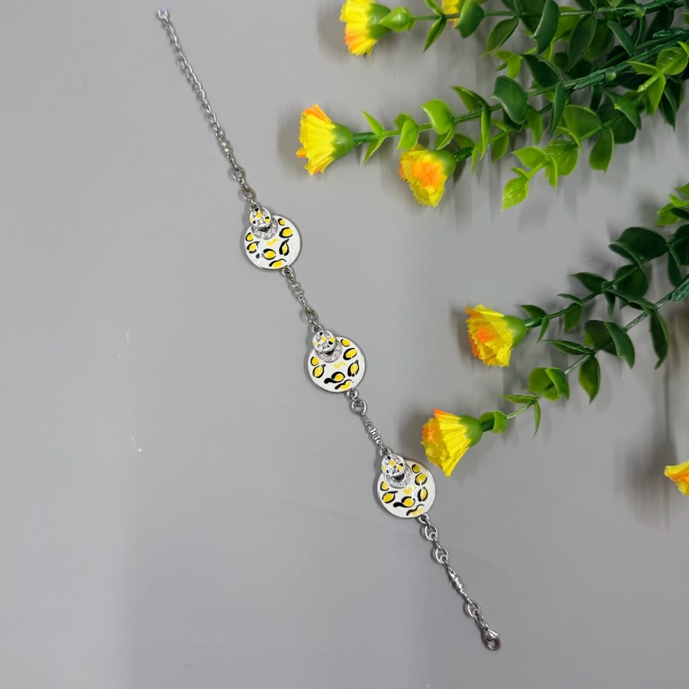 Butler Signed Vintage Chic Silver and Yellow Cheetah Spot Bracelet